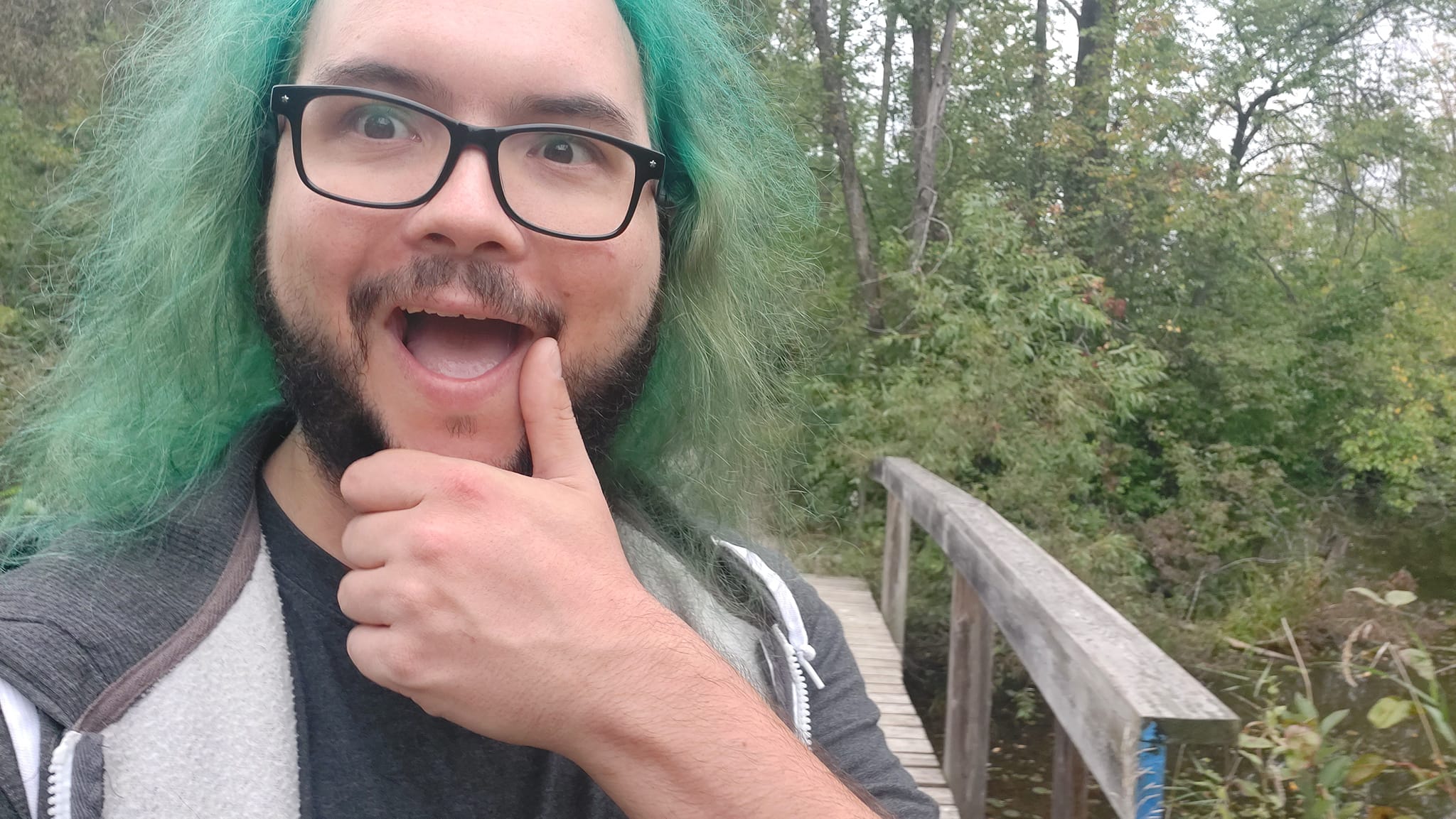 A man with green hair is visiting a freshwater marsh, photo 19